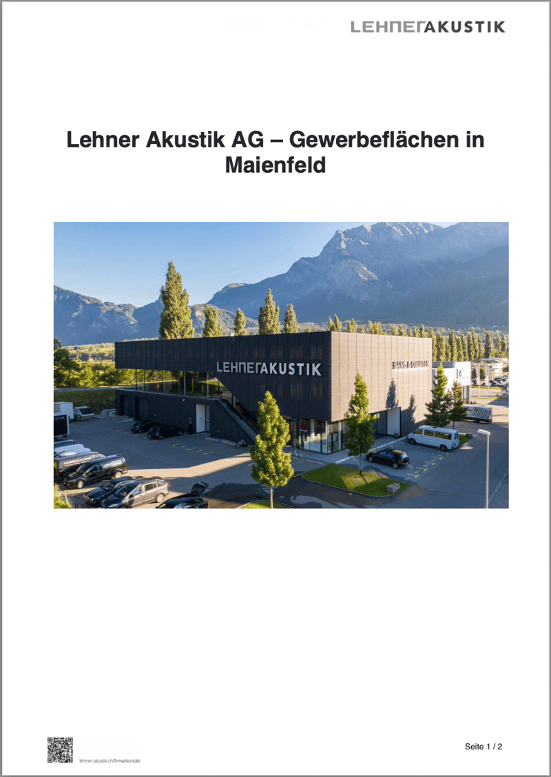 Building, parking, mountains in background