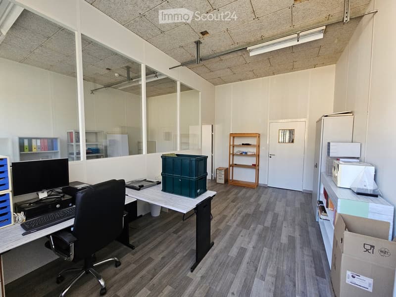 modern office, desk, chair, monitor, keyboards, shelves, boxes, door