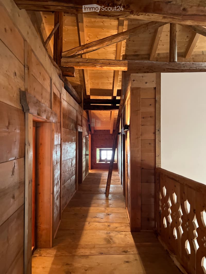 Wooden walls, wooden floor, wooden beams, wooden stairs, hallway