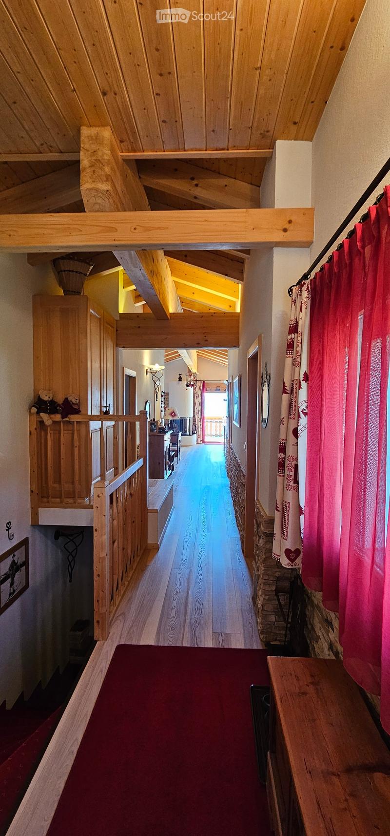 wooden ceiling, wooden floor, red curtains, fireplace, picture frame on wall