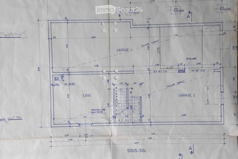 The floor plan includes two garages, an underground parking area, and a room designated as a cave.