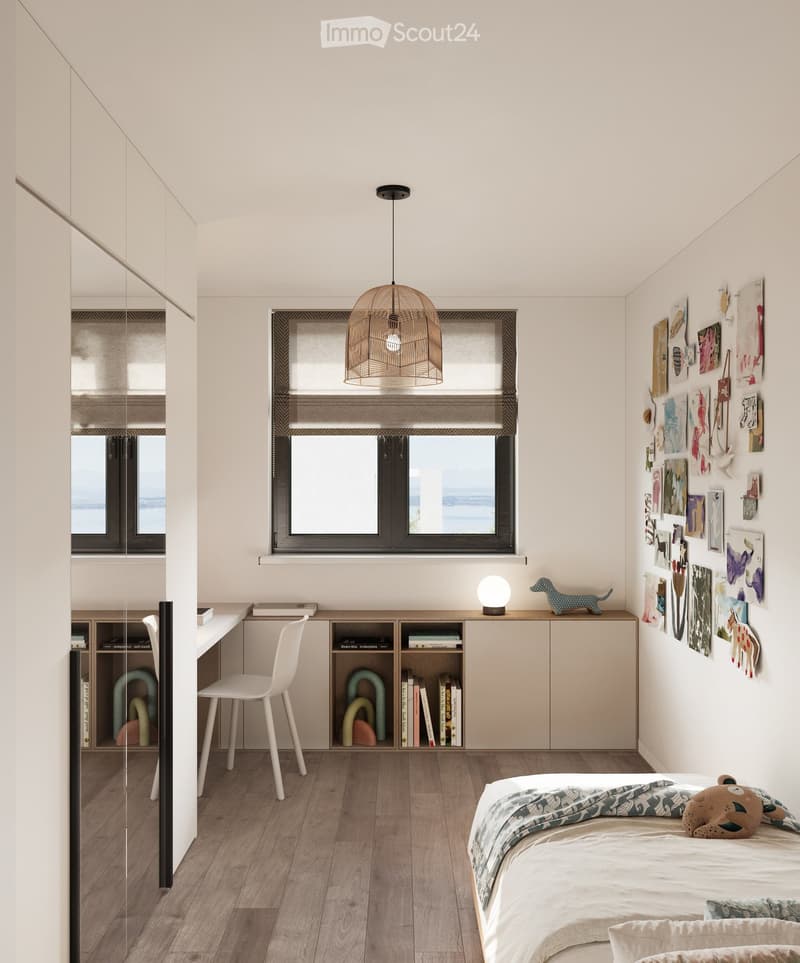 Room with desk, chair, bed, cabinet, wooden floor, lamp, shelf with books, picture wall, and a view