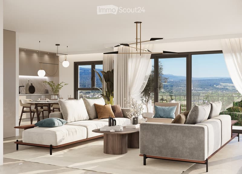 2 couches, coffee table, modern chandelier, large windows, view of mountains