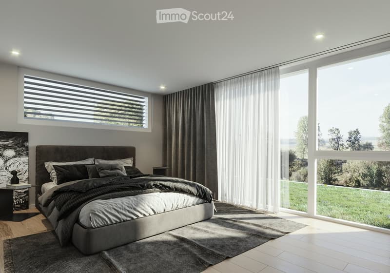 king-sized bed, gray upholstered headboard, large windows, wooden floor, gray area rug, nightstand, artwork, view of grassy field