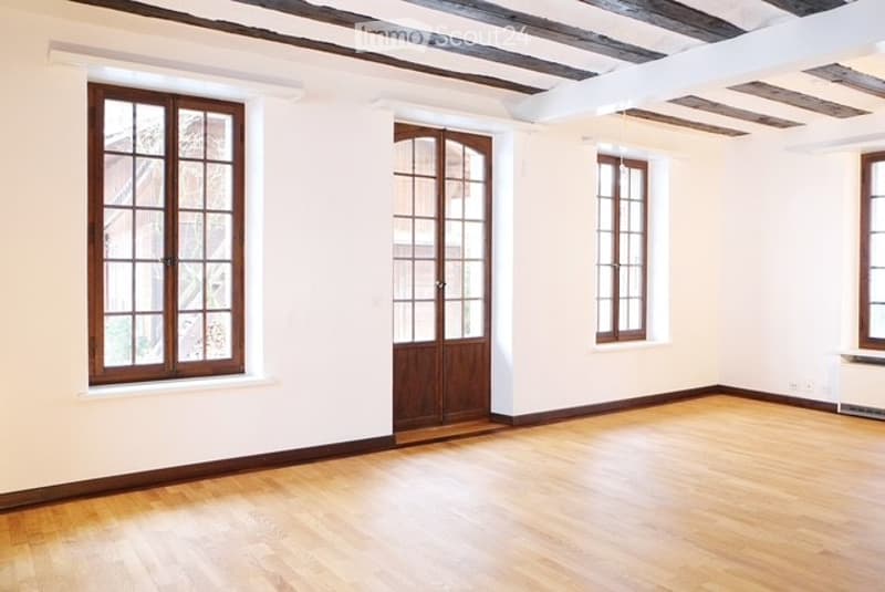wood floor, large windows, wooden ceiling, wooden door