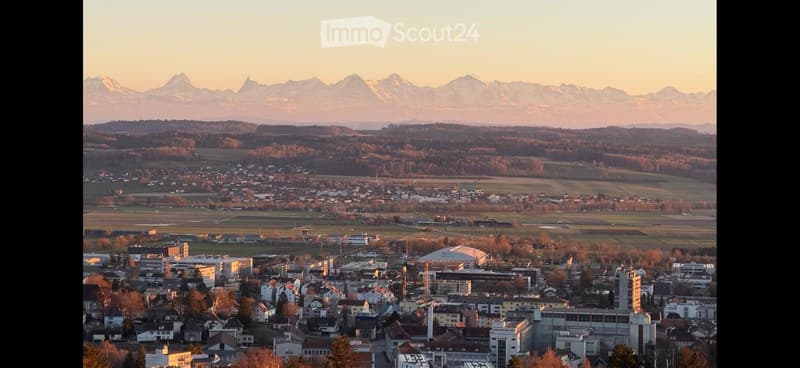 town center, buildings, mountains, countryside, valley