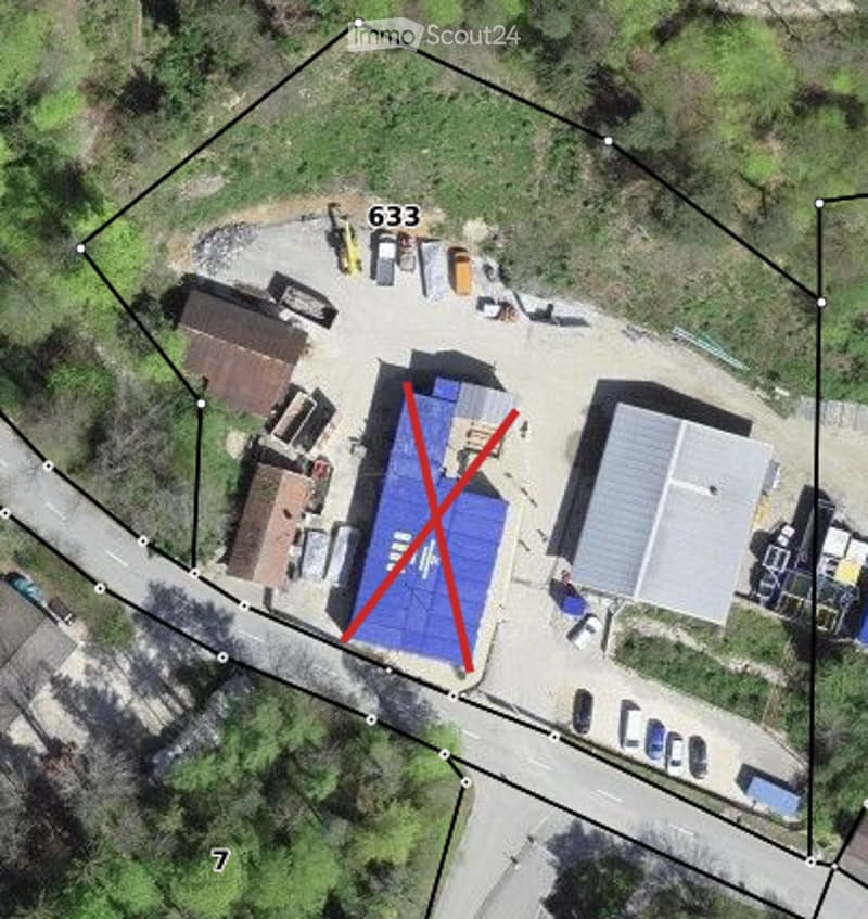 Plot of land with various outbuildings, one marked for construction