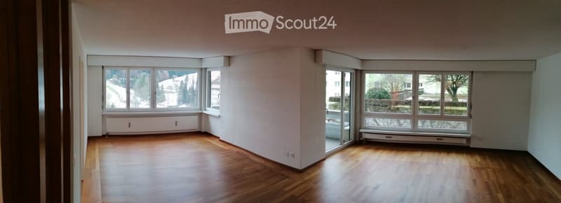 empty room, wooden floor, windows, balcony, white walls