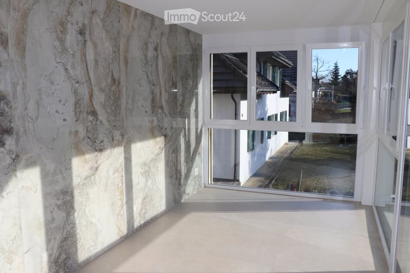 marble wall, tiled floor, large glass windows, exterior view