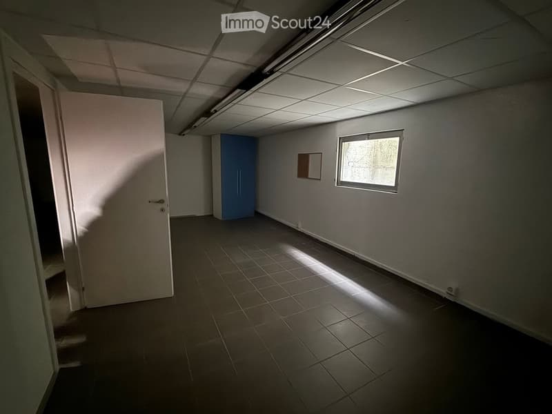 empty room, white walls, tiled floor, blue cabinet, window, door