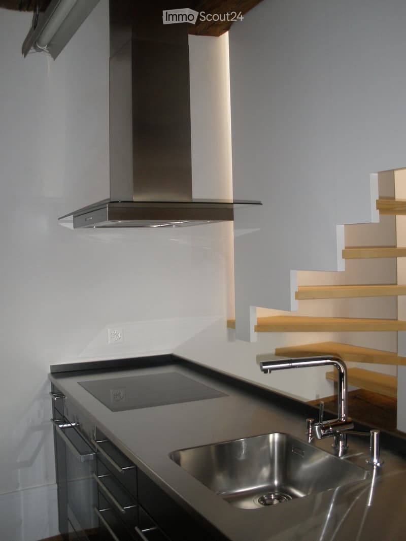 modern kitchen, stainless steel sink, wooden steps