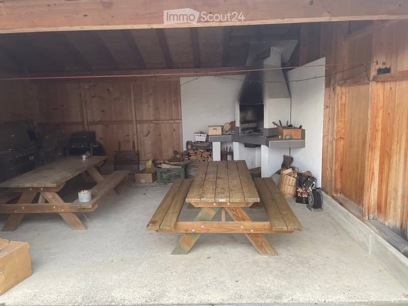wooden storage box, wooden benches, wooden tables, barbecue stove