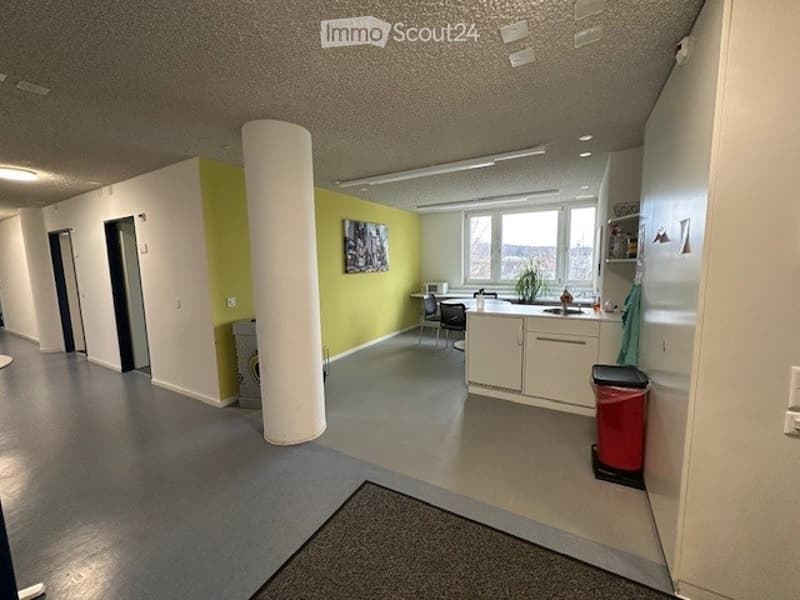 interior, clean, white cabinets, yellow wall, kitchen area, sink, faucet, microwave, washing machine, table, chairs