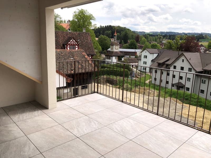 tiled floor, metal railings, view of surrounding houses and landscape