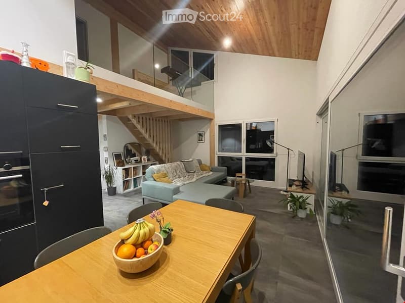 Open plan, modern furniture, wooden table, balcony, dining area, open kitchen, loft stairs