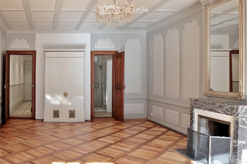 Wooden floor, crystal chandelier, marble fireplace, large mirrors