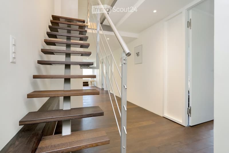 modern staircase, white wall, wooden floor, steel railings