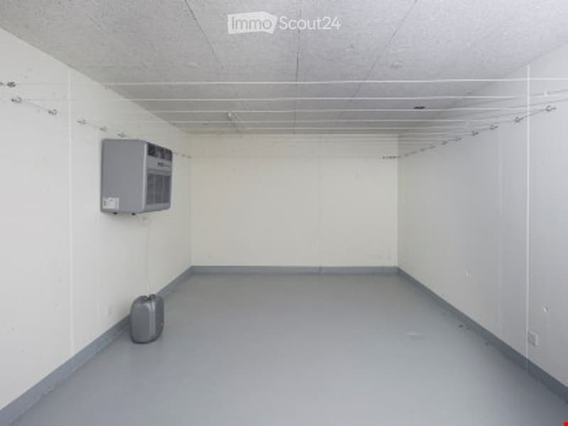 Other. {"output": {    "visible_features": [],    "type": "Room",    "description": "empty room, gray wall, gray floor, air conditioner on wall, storage box on floor",    "localized_descriptions": {        "EN": "empty room, gray wall, gray floor, ai