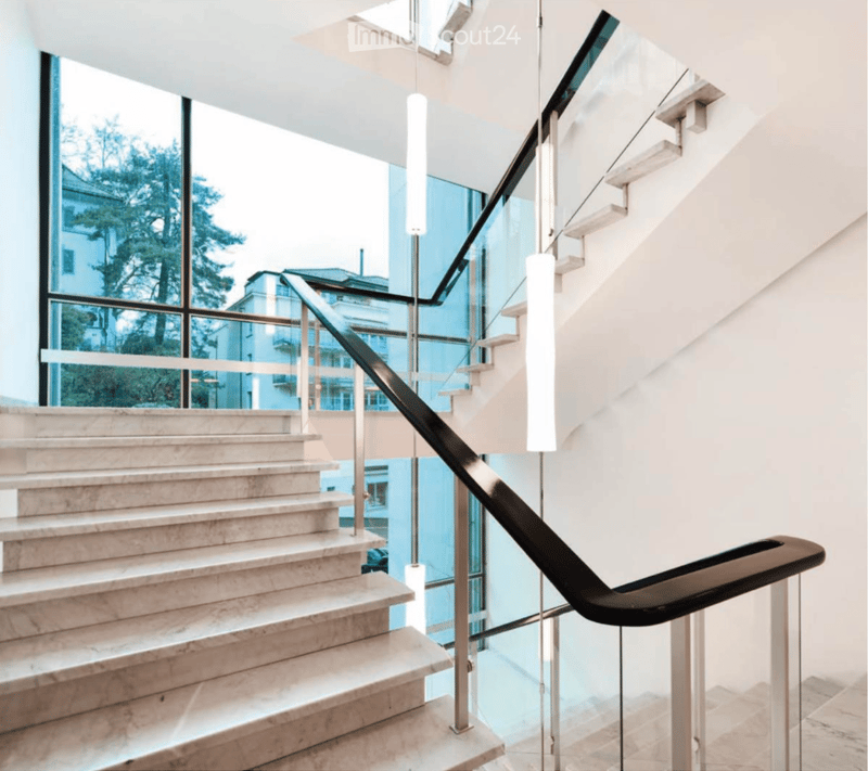 marble staircase, glass railing, metal handrail, glass windows, lamps