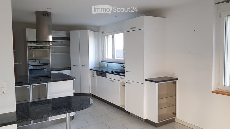 modern kitchen, white cabinetry, black granite countertops, oven, dishwasher, open plan
