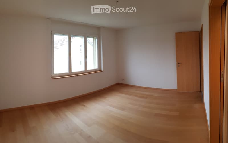 empty room, white walls, wooden floor, window, closed door