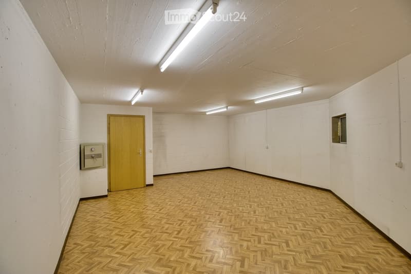 empty, parquet floor, white walls, entrance door, emergency lamp