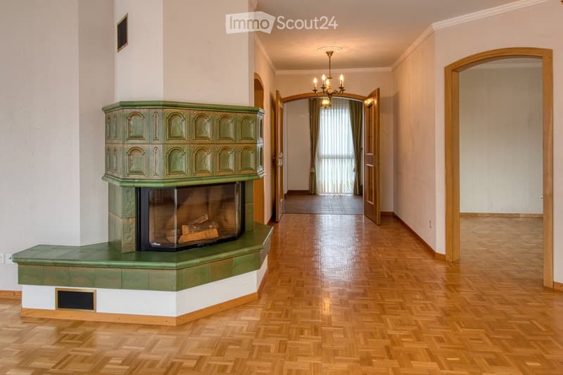 hardwood floor, fireplace, chandelier, power outlet