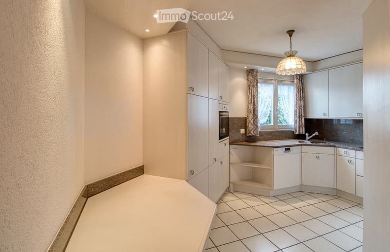 kitchen with oven, dishwasher, washing machine, sink, wooden cabinets, white tile flooring