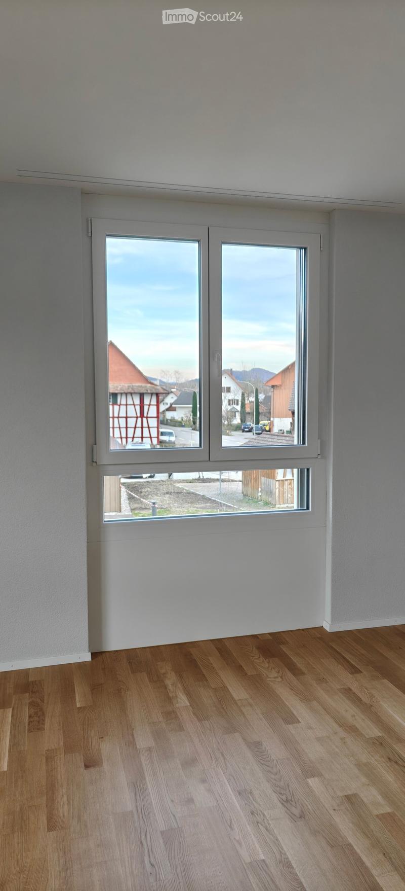 empty room with windows overlooking the outside