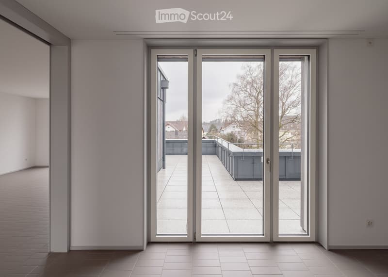 sliding glass doors, balcony, tiled floor, white walls