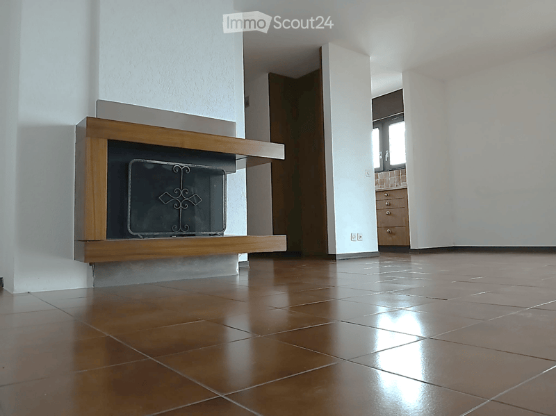 empty room, fireplace, tiled floor, white walls