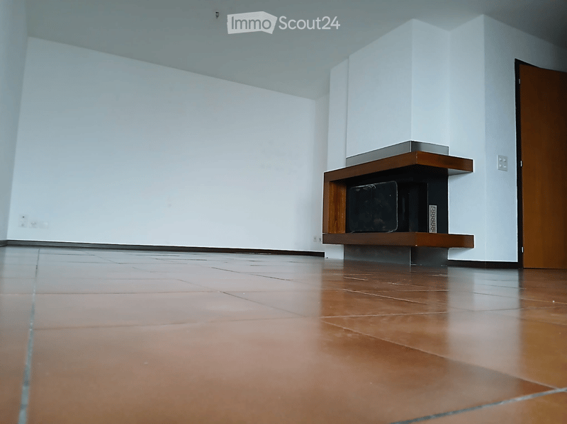 empty room, white walls, wooden floor, fireplace