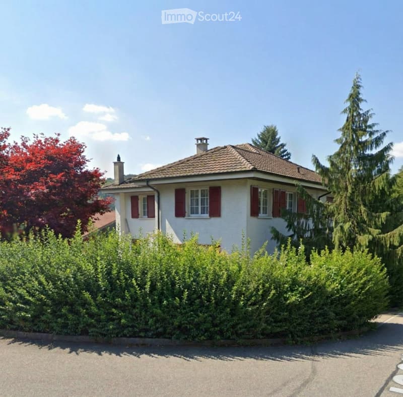 2 story house, white exterior, red shutters, brown roof, hedges, trees, driveway