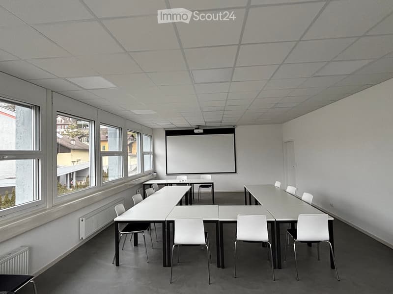 empty room, white walls, white ceiling, white tables, white chairs, projector screen, windows