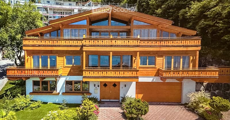 wooden exterior, large glass windows, balcony, garden