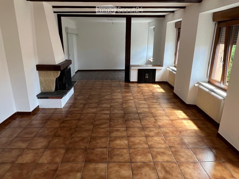 empty room, brown tiles, fireplace, white walls, windows