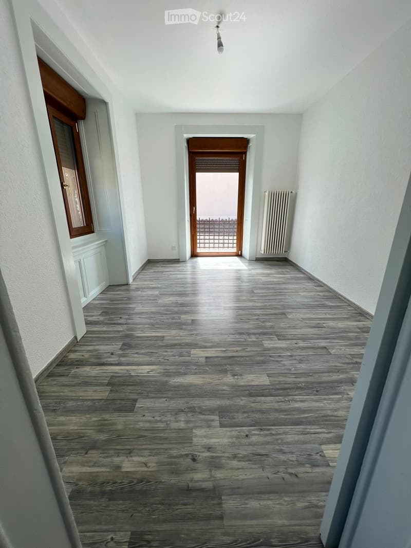empty room, wooden floor, white walls, glass door, balcony, window