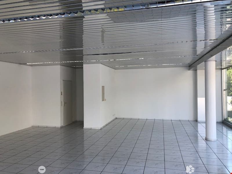 empty room, white walls, white tiled floor, metal ceiling, white door, glass window