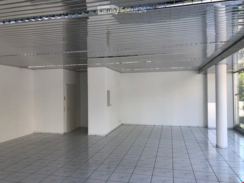 empty room, white walls, white tiled floor, metal ceiling, white door, glass window