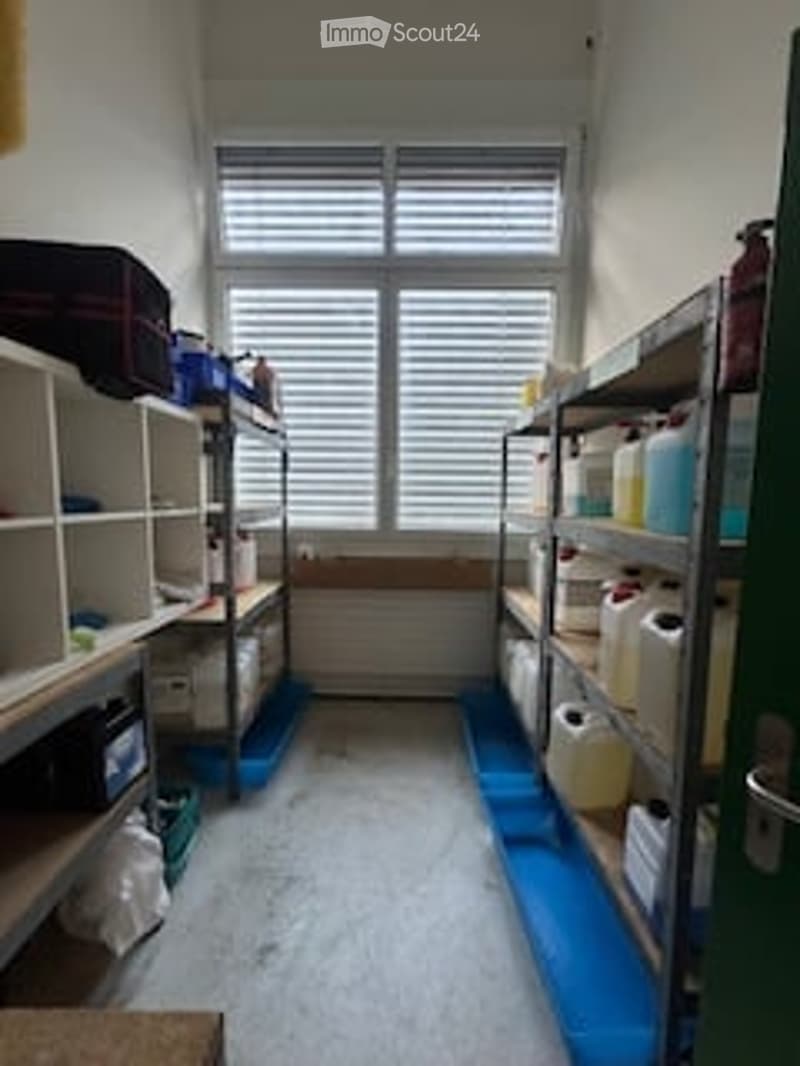 Storage room with shelves, window, and various items