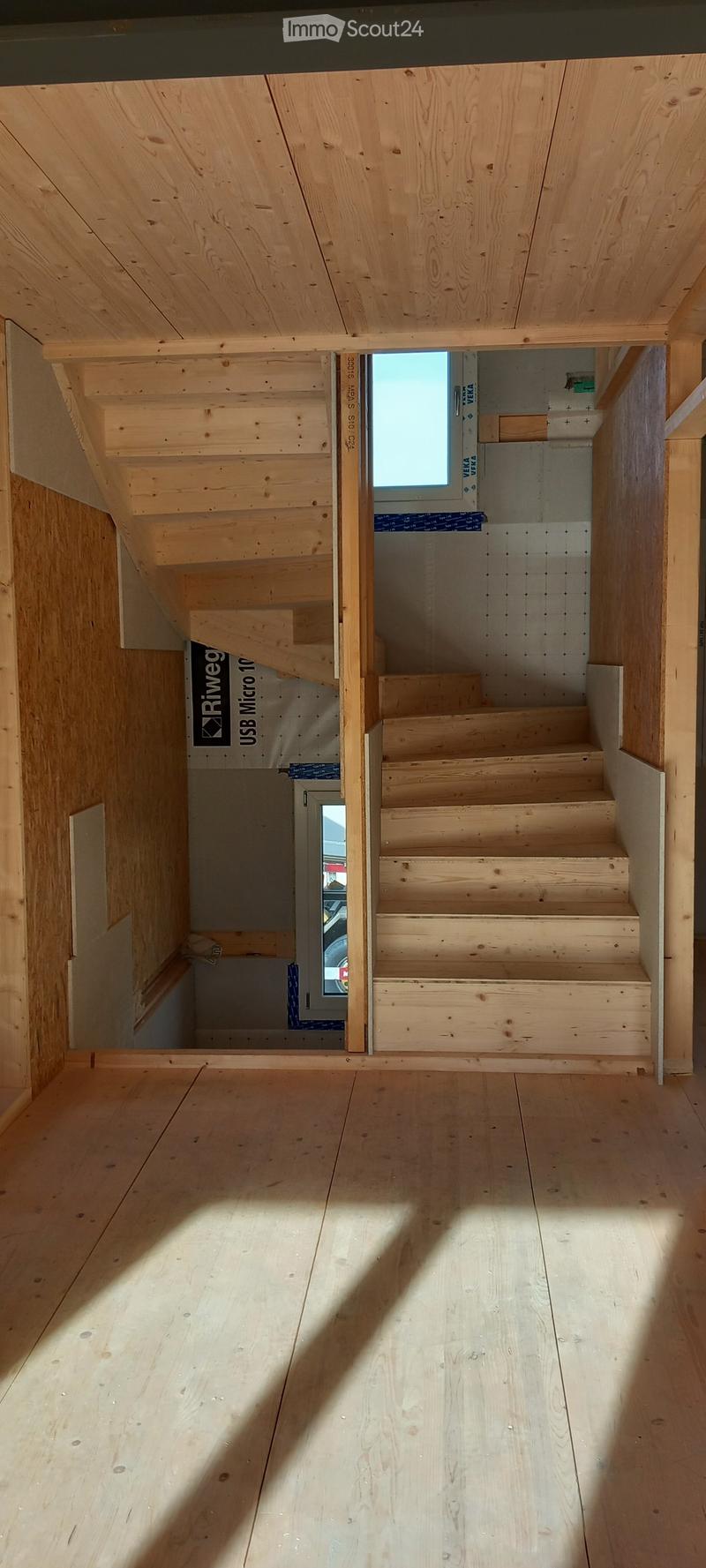 wooden stairs, wooden floor, wooden ceiling, unfinished walls