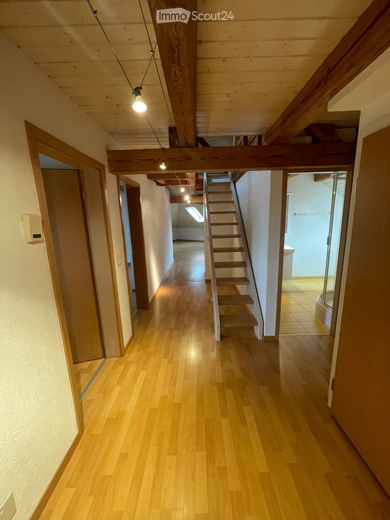 wooden floor, wooden beams, staircase, doors, light