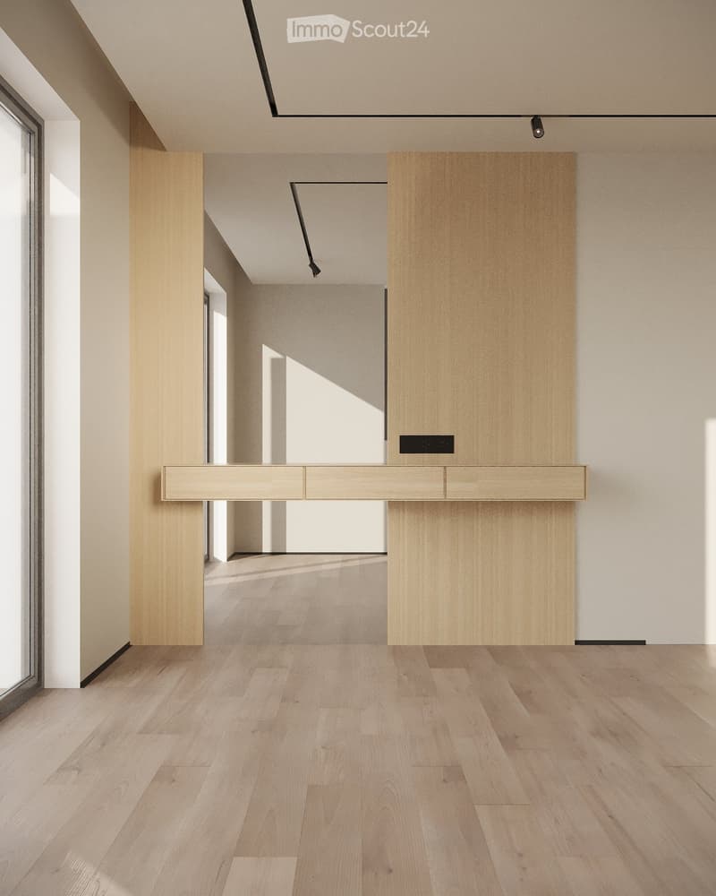Empty hallway with light wooden flooring, white walls, and a modern wooden reception desk in the background.