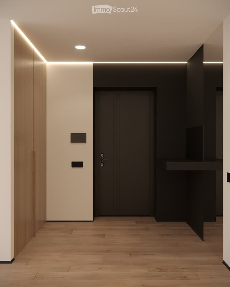 Modern hallway with wooden flooring, white and black walls, recessed lighting, and a central black door.