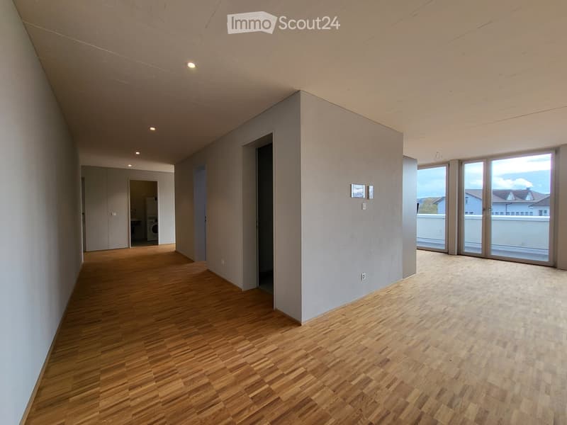 empty room, wooden floor, white walls, sliding glass doors, balcony