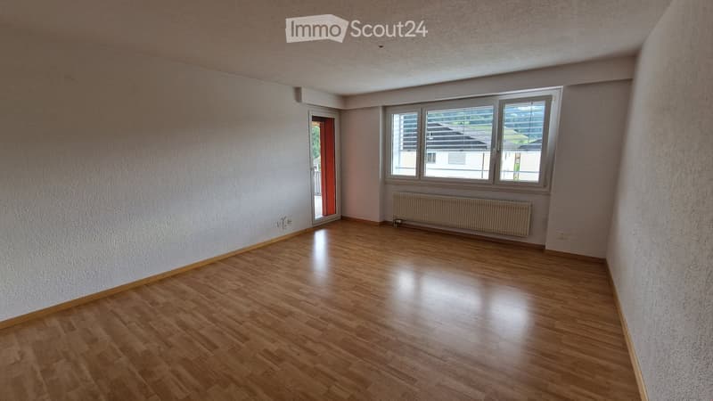 empty room, wooden floor, white walls, glass door, window with blinds, radiator