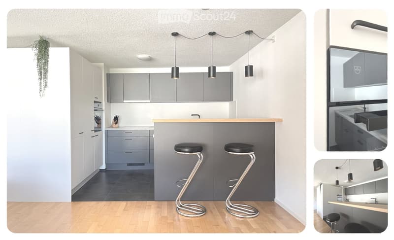 modern kitchen with island, gray cabinets, wooden floor, two bar stools, hanging lamps, sink, faucet, appliances