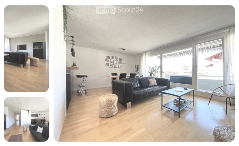 modern living room with black leather sofa, coffee table, large windows, balcony, wooden floor, white walls, decorative items