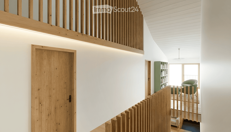 wooden door, wooden railing, white walls, wooden ceiling, wooden floor, green bookshelf, white chair, white sofa