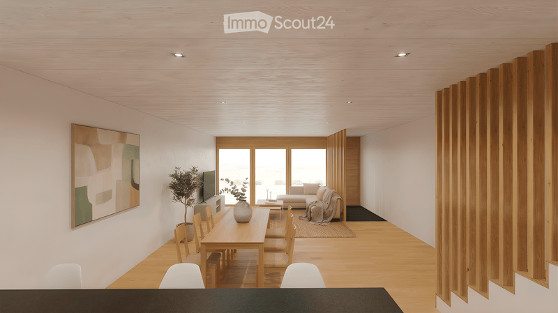Dining room with wooden table, chairs, and a painting on the wall. A couch and a TV are in the living room. A carpet is on the floor. The room has a glass window with a view of the outside.